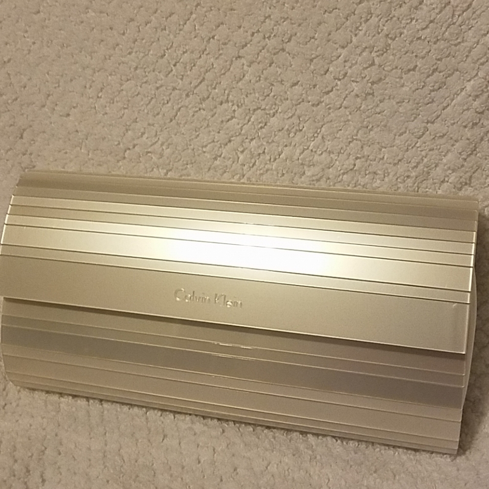 NWOT Calvin Klein Iridescent Silver Clutch